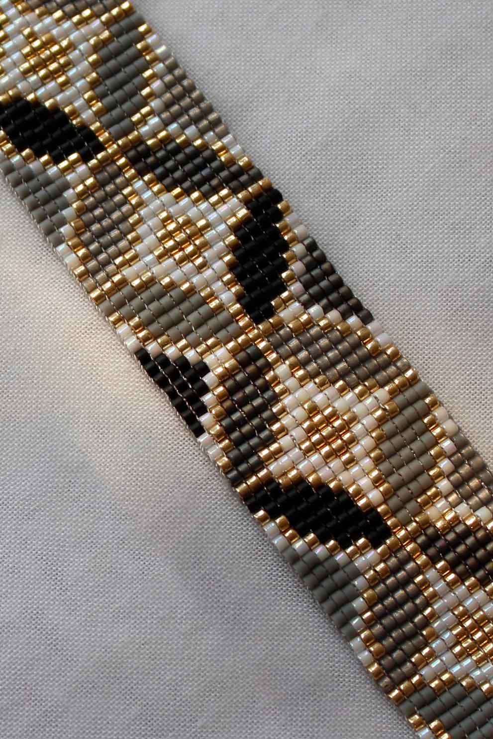 دستبند میوکی - طرح دایره - سفید - طوسی - مشکی - طلایی