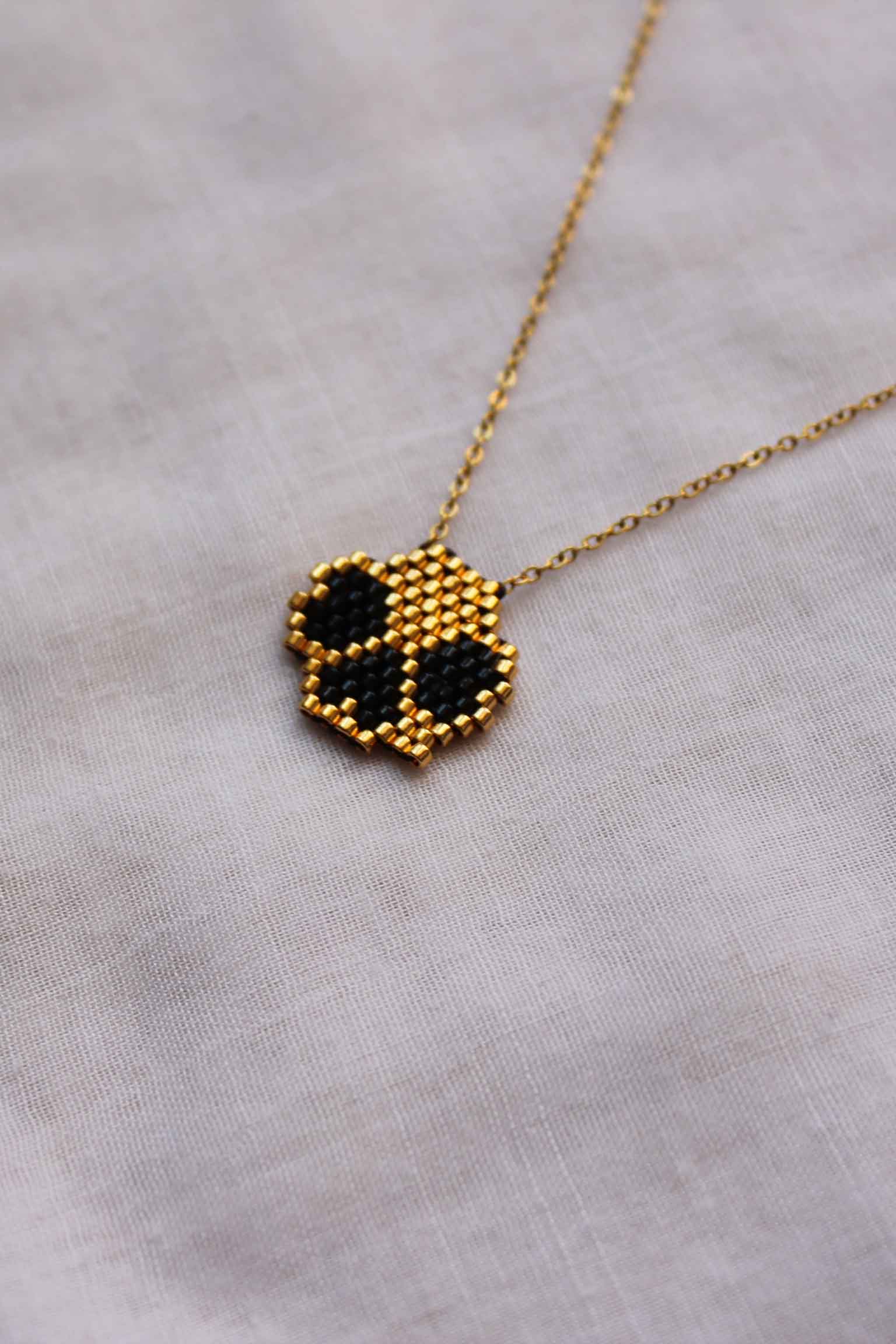 نیم ست گردنبند و گوشواره - شبدر چهار برگ - مشکی - طلایی